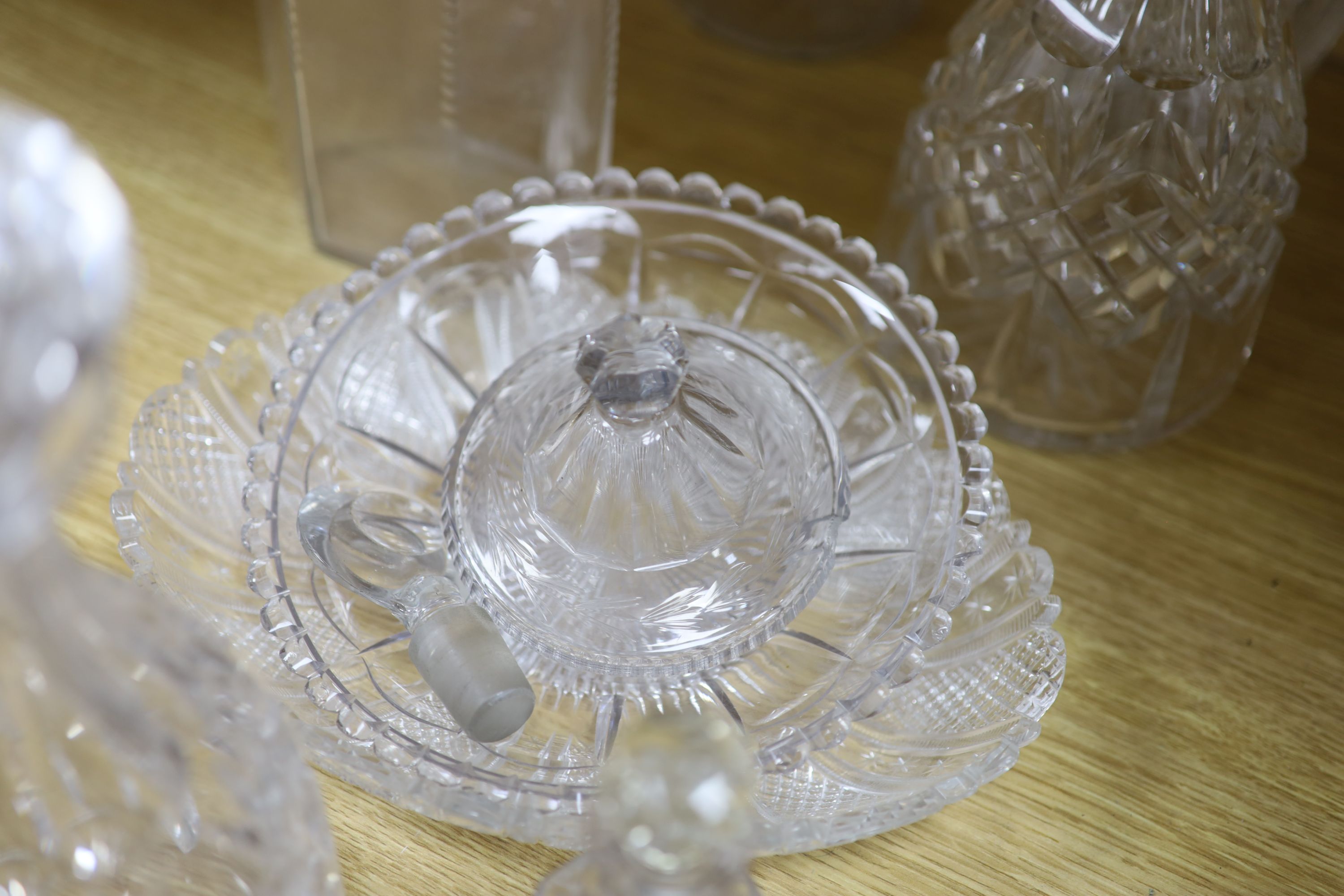 A pair of cut glass decanters, two others and mixed cut glass